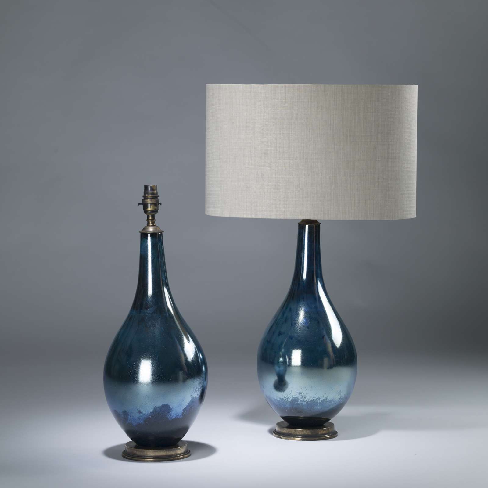 Pair Of Medium Blue Metallic Glass Teardrop Lamps On Brass Bases