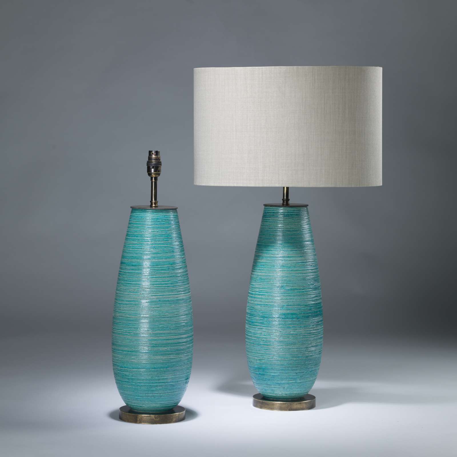 Pair Of Medium Blue 'twirl' Ceramic Lamps On Brass Bases (T4068
