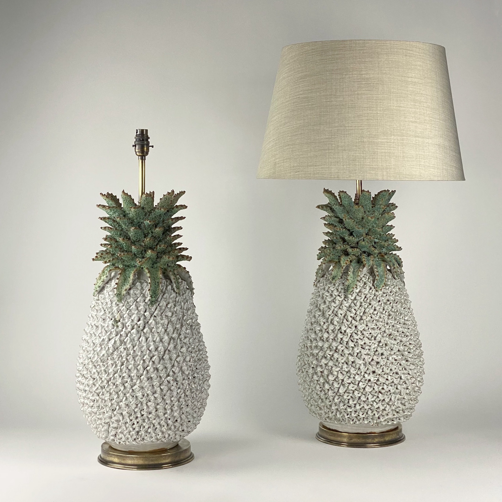 Pair Of Large White Ceramic Pineapple Lamps With Green Leaf Tops On ...