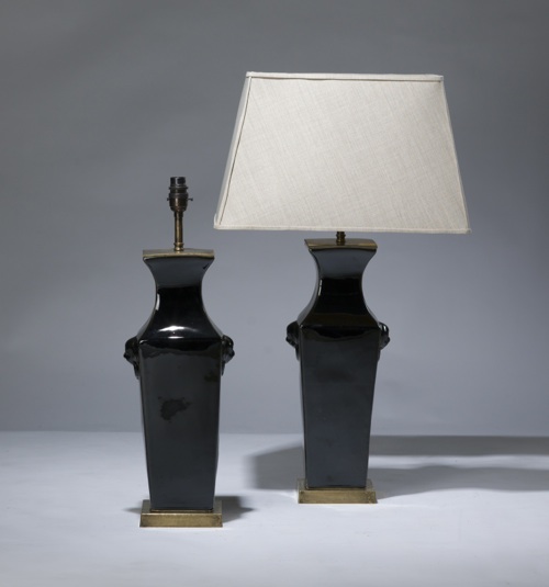 Pair Of Medium Black Ceramic Lamps On Distressed Brass Bases