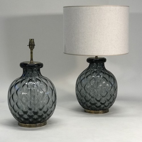 Pair Of Medium Grey Glass 'moulded' Lamps On Antique Brass Bases
