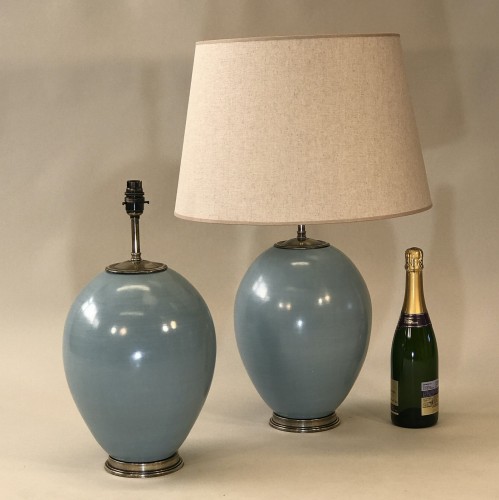 Pair Of Medium Blue Ceramic 'balloon' Lamps On Antique Brass Bases