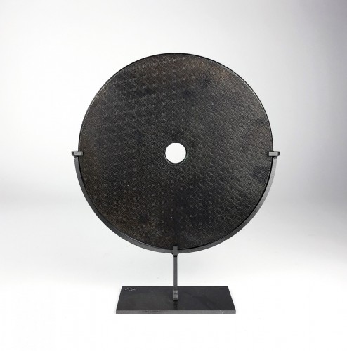 Large Black Disk on Brown Bronze Stand