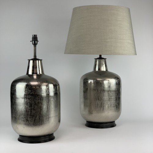 Pair Of Silver Textured Metal Lamps On Brown Bronze Bases