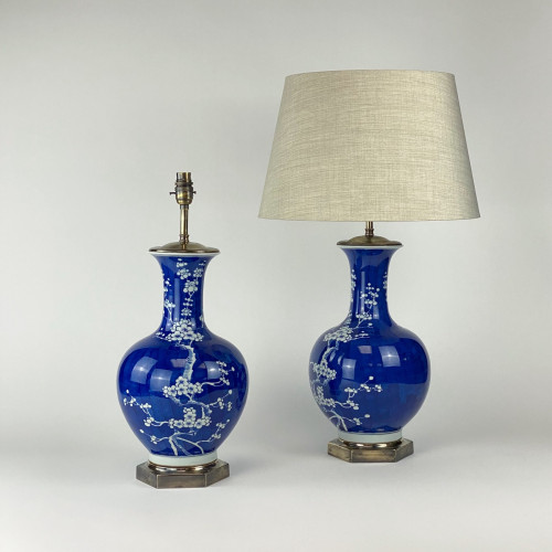 Pair Of Medium Blue Ceramic Chinese Blossom Lamps On Antique Brass Bases