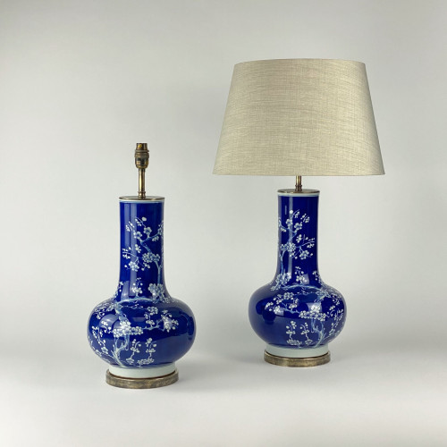 Pair Of Medium Blue Ceramic Chinese Blossom Lamps On Antique Brass Bases