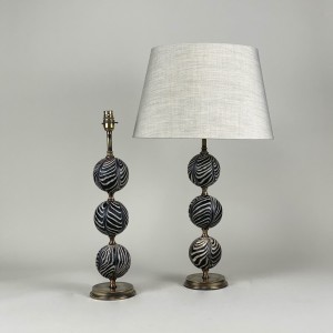 Pair Of Black 'zebra' Majapahit Glass Bead Lamps With Antique Brass Bases (T5482)